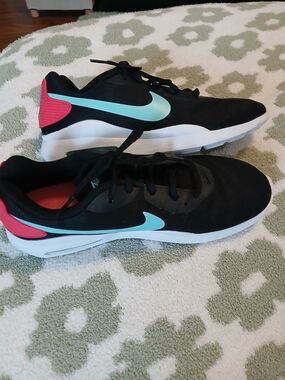Nike Black Athletic Shoes with Teal Swoosh and Pink Heel Accents